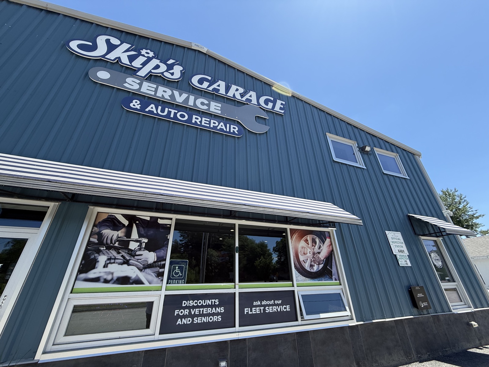 Skip's Garage front entrance and service signage