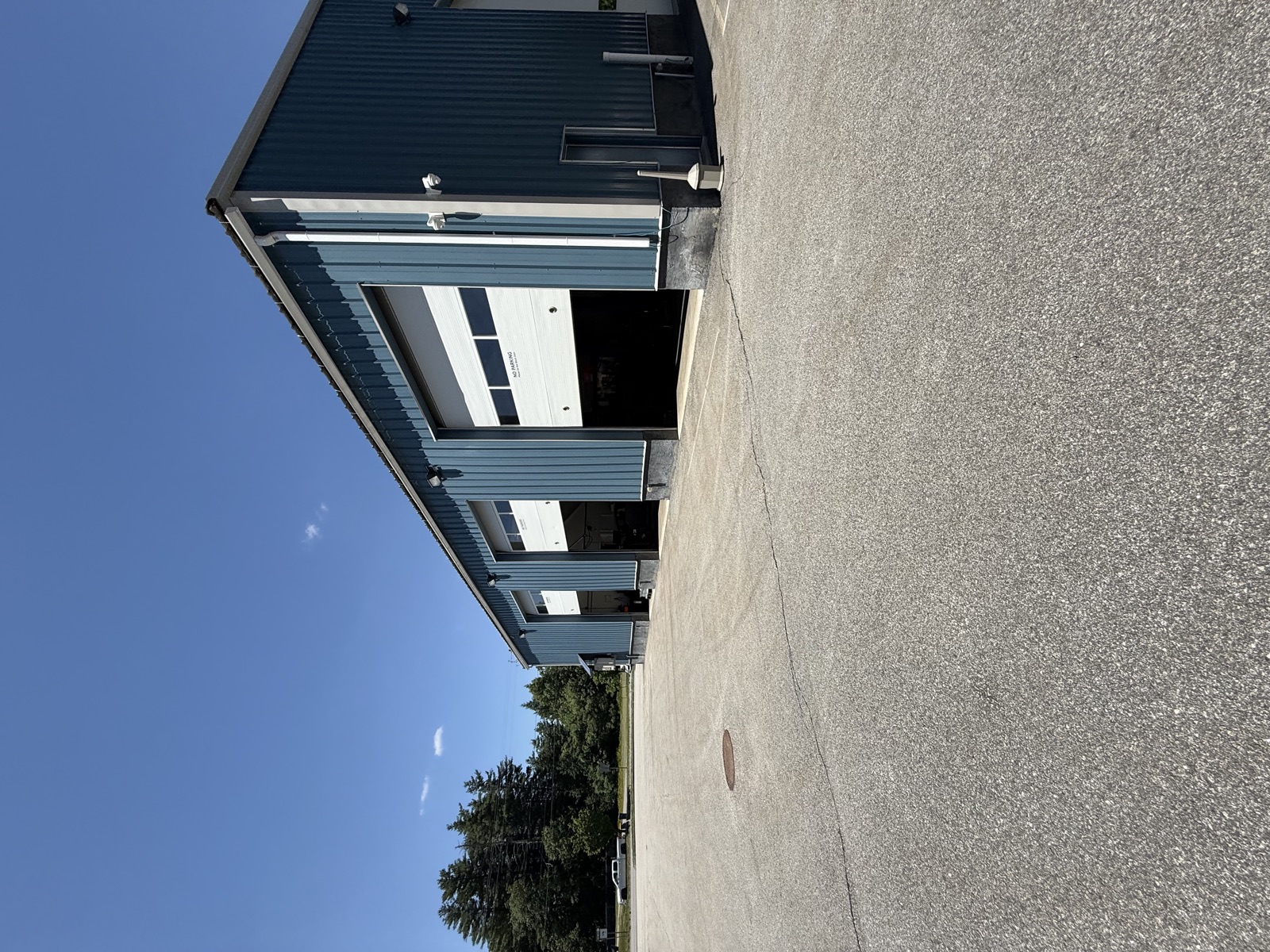 Service bay doors and shop exterior